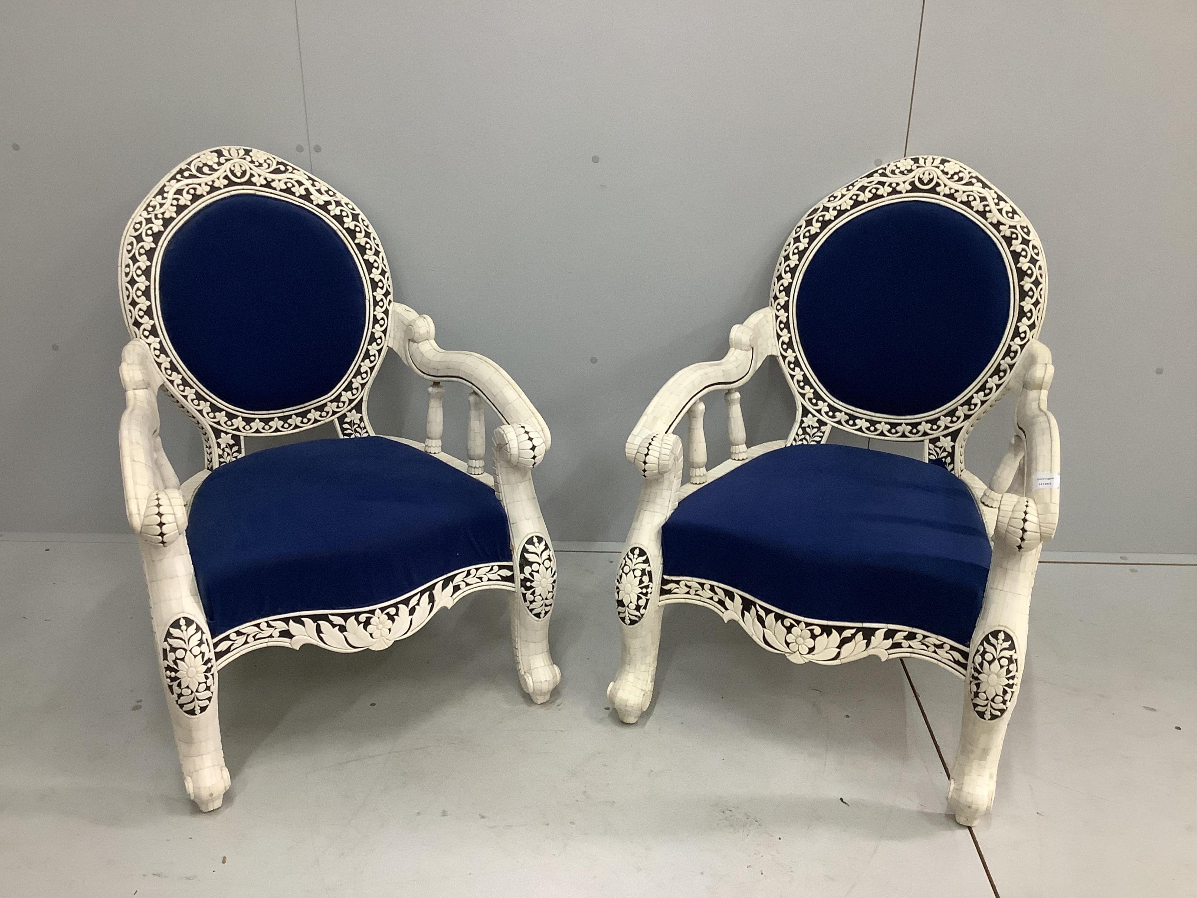 A pair of Indian bone veneered armchairs, width 67cm, depth 56cm, height 93cm. Condition - fair